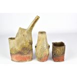 BEDE CLARKE; a wood fired stoneware soy bottle, a lugged vase and square lugged cup, impressed