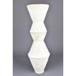 GISELLE HICKS; an angular stoneware stacked vase covered in matt white glaze, painted GH CD mark,