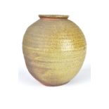 CLAYTON AMEMIYA; a large wood fired stoneware jar with incised lines to shoulder, height 31.5cm.