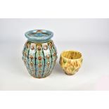 PAUL YOUNG (born 1961); a slipware jar and cover decorated with medallions and a cup, tallest 20.5cm