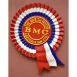 THE BRITISH MOTOR CORPORATION LTD; a vintage advertising fibreglass rosette with embossed text,