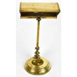 A brass library lamp on circular base, patent no. 342705, height 39.7cm.Additional InformationSome