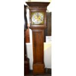 An oak eight day longcase clock with associated movement, the silvered dial set with Arabic and