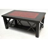A contemporary coffee table with black and red painted finish, 111 x 60.5cm.