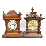 Two early 20th century bracket clocks to include a walnut example, the circular enamelled dial set