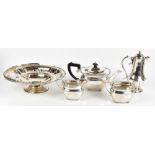 A small group of silver plate to include a three piece tea service, swing handled basket etc (5).