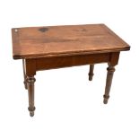 A stained pine fold over dining table with swivel top, raised on column supports,  height 69.5cm,
