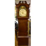 A mid-19th century mahogany and rosewood cross banded eight day longcase clock, the arched painted