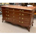 A large early 20th century French walnut chest with moulded top above two short and three long