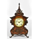 LENZKIRCH; a burr walnut veneered Art Nouveau mantel clock with applied gilt metal detail of