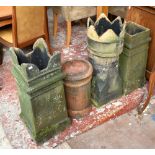 Four chimney pots including a castle top example, height 77cm (part af).Additional