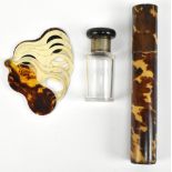 An Edwardian faux tortoiseshell cylindrical needle case, height 13cm, a silver mounted glass