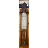 An oak cased Admiral Fitzroy barometer with carved detail to upper section, height 124cm, width