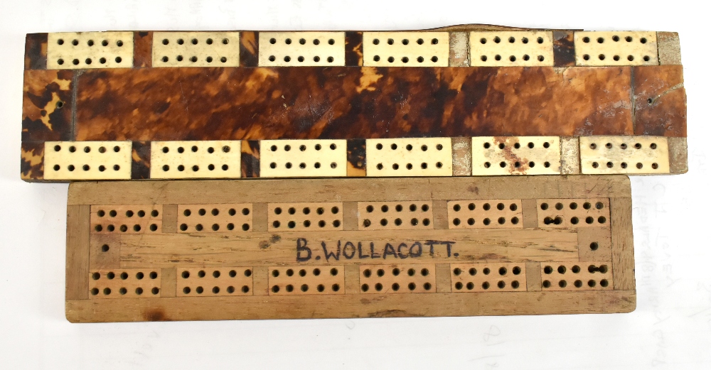 A tortoiseshell and bone cribbage board, length 24cm (af), and a homemade wooden cribbage board,