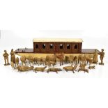 An early 20th century wooden model of an ark, length 71cm, and various later carved treen figures