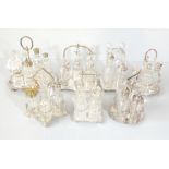 Seven silver plate mounted glass condiment sets including a seven piece example, etc.Additional