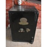 J PARISH & SON; a 19th century cast iron fire resistant safe, with key, height 61cm.