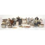 A group of silver plated items including numerous hip flasks and cups, some with monograms, tea