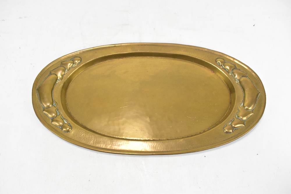 BELDRAY; an oval Arts and Crafts brass tray, relief decorated with Voysey-style panels, length