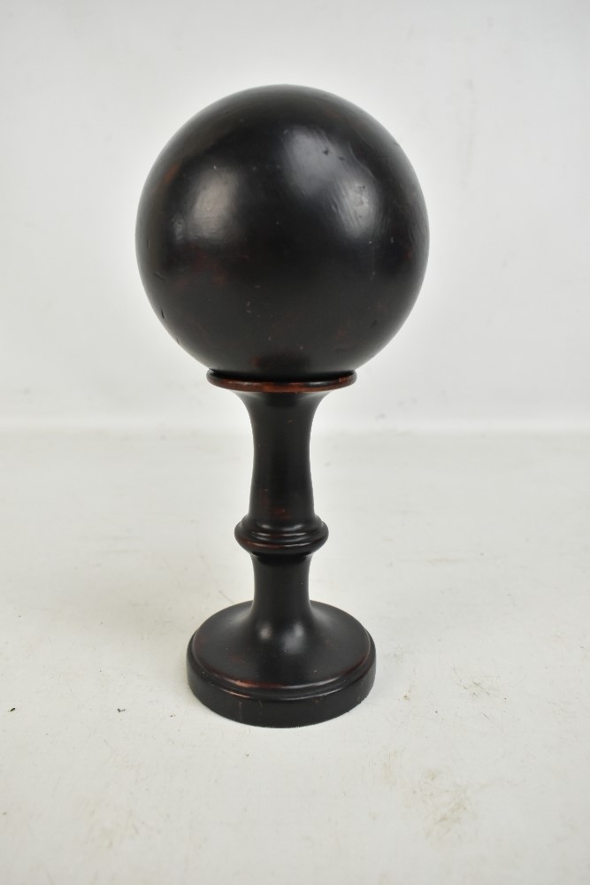 A mid 20th century ebonised ball on turned wooden stand, diameter of ball approx 11cm, overall - Image 2 of 4