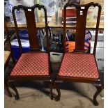A set of eight Edwardian mahogany Queen Anne style dining chairs with shaped top rail, rectangular