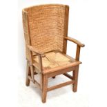 An early 20th century oak framed child's Orkney chair, height 85cm.Additional InformationMinor
