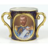 VIENNA PORCELAIN; a blue glazed tyg with gilt highlights commemorating the Coronation of King George