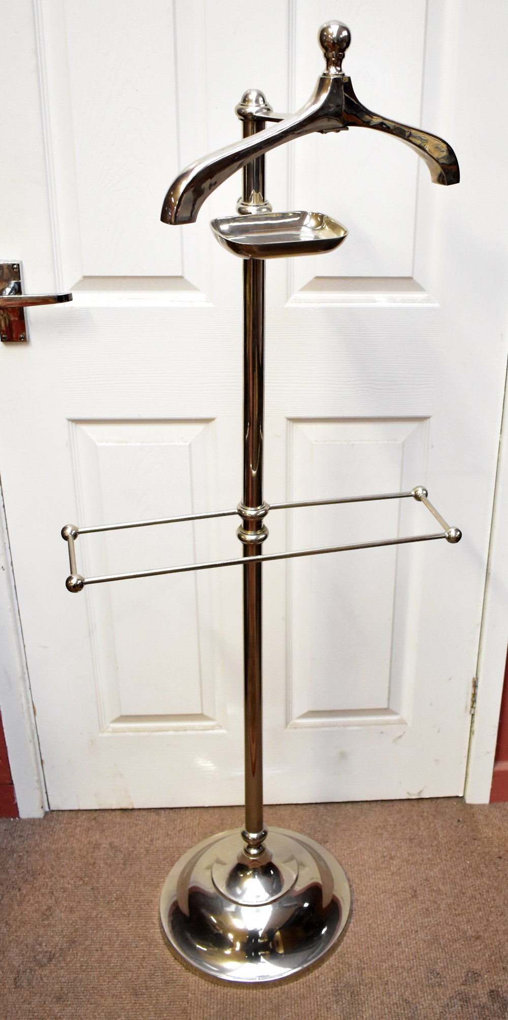 A contemporary chromed 'Valet de Chambre', height 142cm but adjustable.Additional InformationSome