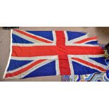 A large Union Jack flag, approx 262 x 135cm (af).Additional InformationLarge area of fraying/rip