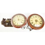Two GPO wall clocks, each set with Roman numerals, diameter of largest example 30cm, together with a