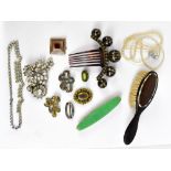 A small group of costume jewellery, including a Victorian mourning brooch, paced brooch, simulated