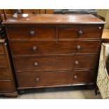 A Victorian mahogany chest of two short and three long drawers, raised on bun feet, width  122cm.