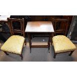Two Edwardian nursing chairs and an Edwardian inlaid mahogany coffee table (originally from a nest