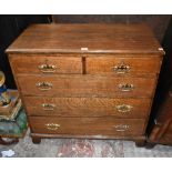An 18th century oak straight front chest of two short over three long drawers, raised on bracket