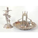 A Victorian silver plated table centrepiece with central cherub beneath arch, 22 x 29 x 33cm (af),