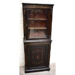 A Victorian ebonised double pier cabinet with applied gilt metal ram head masks, beaded and