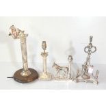 A silver plated lamp base modelled as a horse, height 20cm, and two Corinthian column lamp bases,