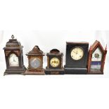 Five Victorian and later mantel clocks to include an American example, a lacquered cased example