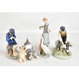 ROYAL COPENHAGEN; a shepherd figure, height 20.5cm, two Lladro figurines including a man with a