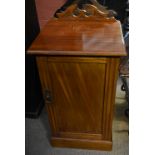 An early 20th century mahogany pot cupboard with single cupboard door to plinth base, width 40.5cm.