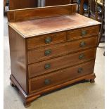 A 19th century inlaid mahogany chest of two short over three long drawers, raised on bracket feet,