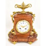 A late 19th century French inlaid kingwood veneered and gilt metal mounted eight day mantel clock