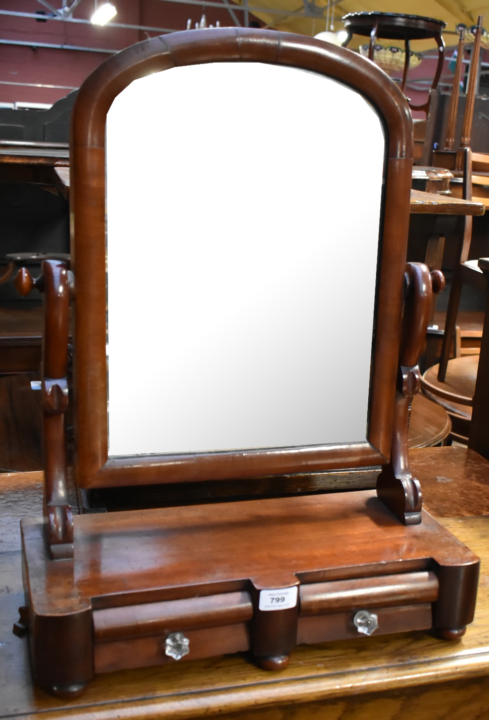 A Victorian mahogany swing toilet mirror with two drawers to the base, width 45.5cm.Additional