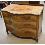 A George III mahogany serpentine fronted dressing chest, the top drawer with fitted interior above