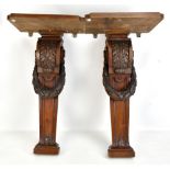 A pair of Victorian carved mahogany pilasters with acanthus scroll detail, now attached to platforms