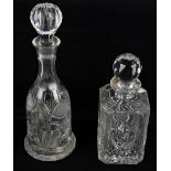 A square sectioned cut glass decanter, height 25cm, and a bell shaped decanter, height 34.5cm (2).