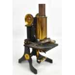 J SWIFT & SON OF LONDON; a late 19th/early 20th century microscope with brass plated column,