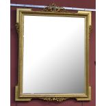 A rectangular gilt gesso mirror with folite scroll and beaded detail, 85 x 67.5cm.Additional