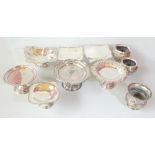 A group of silver plated items including a pair of Art Deco pedestal cake stands, pierced bowls,