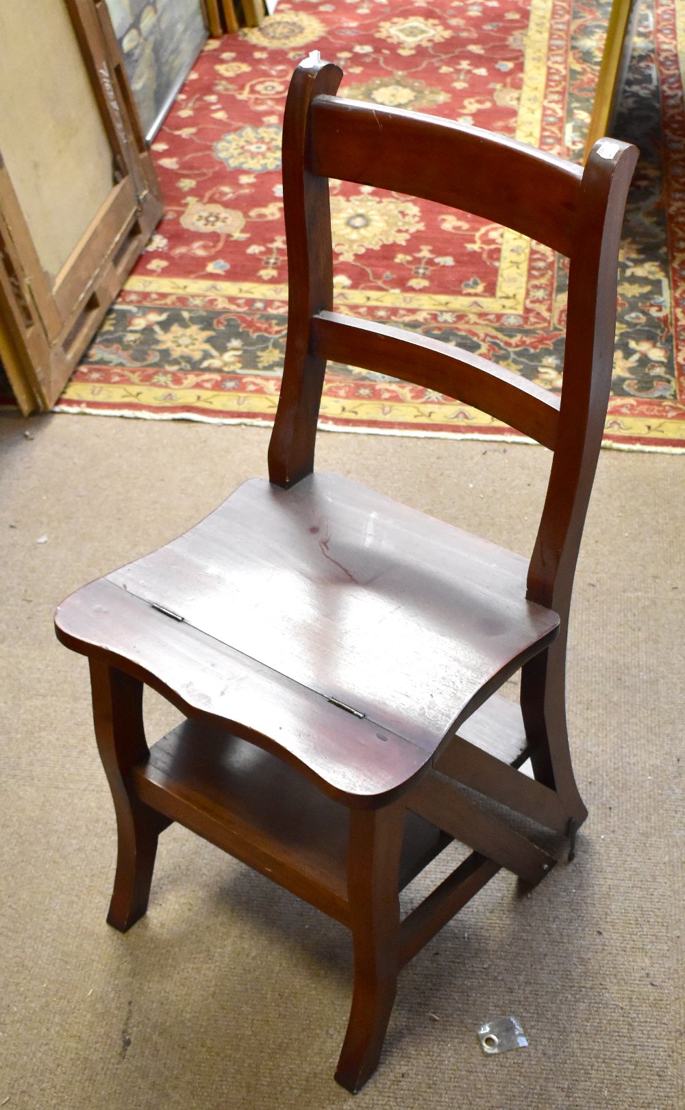 A reproduction mahogany folding library step chair. Additional InformationScratches/indentations and